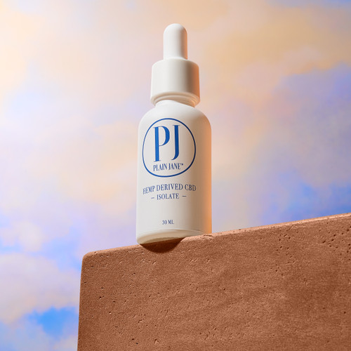 Bottle of preimium CBD isolate oil by Plain Jane