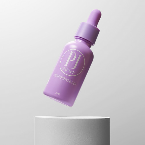 CBN oil, purple plastic bottle with child proof lid containing 1000 mg on a grey background